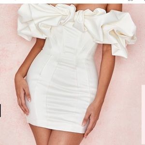 House of CB dress tailored to fit like a medium!